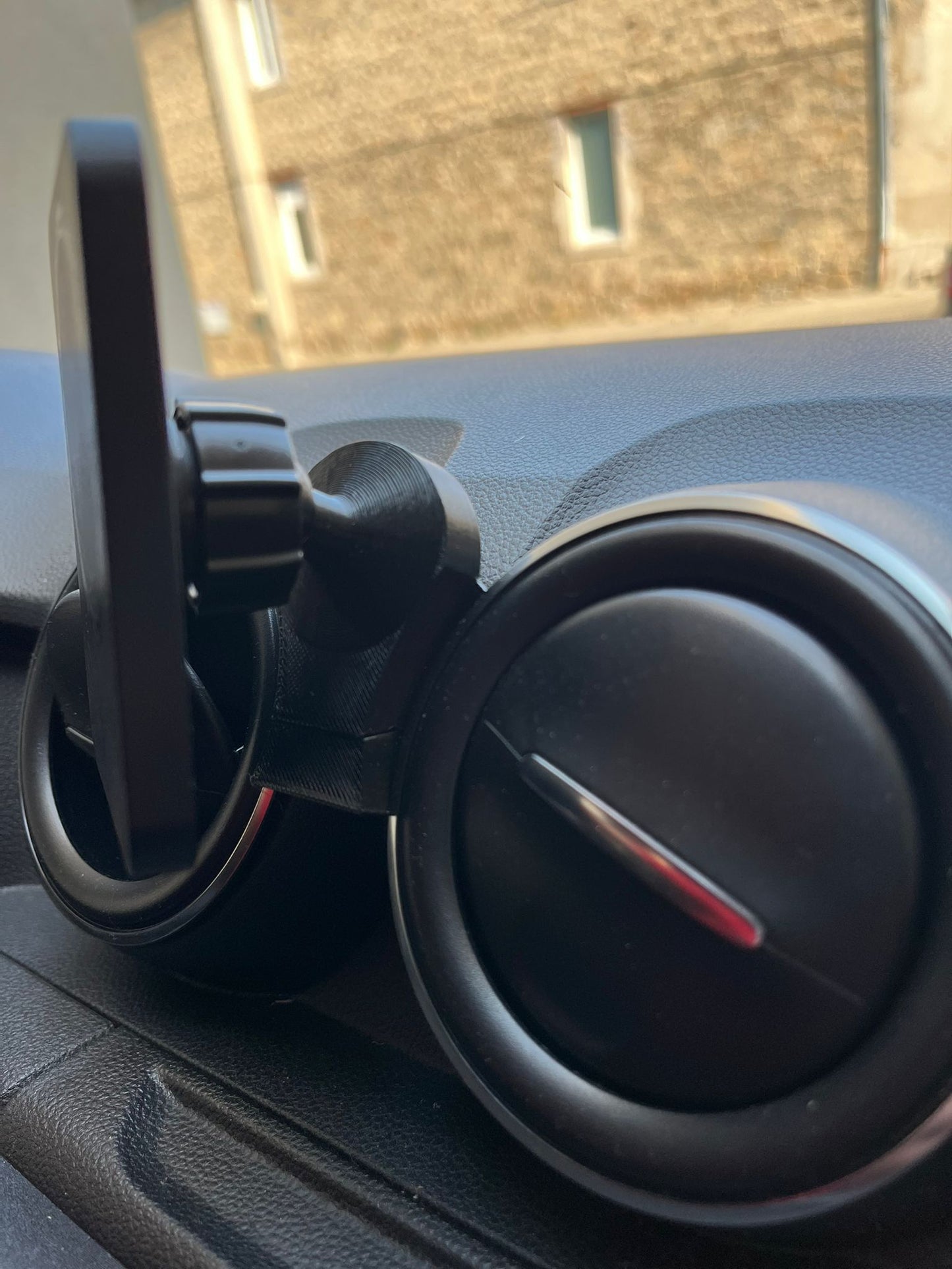 Support de téléphone à induction pour Dacia Duster – Fixation sans abîmer les grilles
